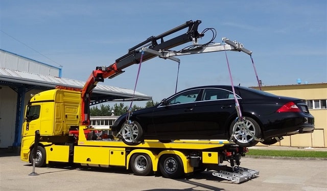 Виды автоэвакуаторов и особенности их применения - Эвакуатор с гидроманипулятором