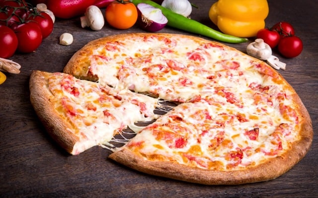 Мистецтво домашньої піци: від класики до творчих експериментів - фото5 Мистецтво домашньої піци: від класики до творчих експериментів - фото5