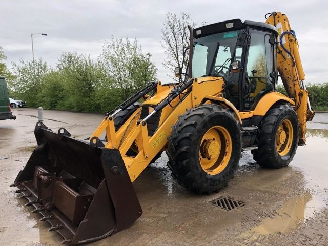 Чем экскаватор-погрузчик отличается от фронтального погрузчика - фото2 Чем экскаватор-погрузчик отличается от фронтального погрузчика - фото2