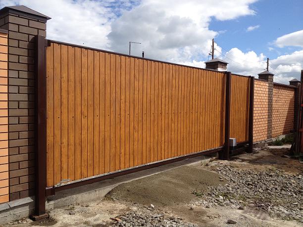 Откатные ворота или распашные: что лучше и практичнее - фото2