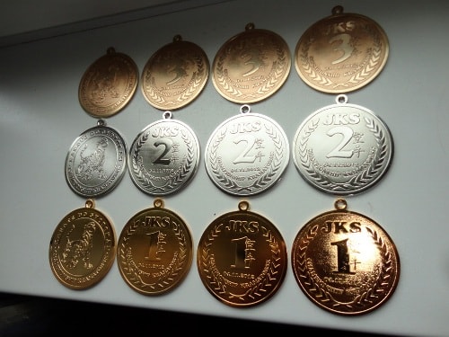 Как делают медали для соревнований? - фото 1