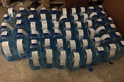 На складе в Харькове работал цех по производству паленой водки для местных «наливаек»